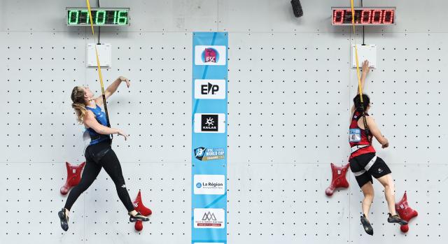 (250712) -- CHARMONIX, July 12, 2025 (Xinhua) -- Zhang Shaoqin (R) of China competes during the Women's Speed Qualification of sport climbing at the 2025 IFSC Climbing World Cup Speed-Lead in Charmonix, France, July 11, 2025. (Xinhua/Gao Jing)