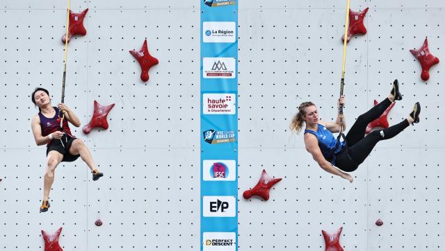 (250712) -- CHARMONIX, July 12, 2025 (Xinhua) -- Zhang Shaoqin (L) of China reacts during the Women's Speed Qualification of sport climbing at the 2025 IFSC Climbing World Cup Speed-Lead in Charmonix, France, July 11, 2025. (Xinhua/Gao Jing)