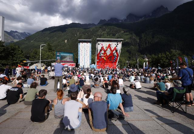 (250712) -- CHARMONIX, July 12, 2025 (Xinhua) -- People watch the 2025 IFSC Climbing World Cup Speed Qualification games in Charmonix, France, July 11, 2025. The 2025 IFSC Climbing World Cup Charmonix Speed-Lead is held here from 11 to 13 July. (Xinhua/Gao Jing)