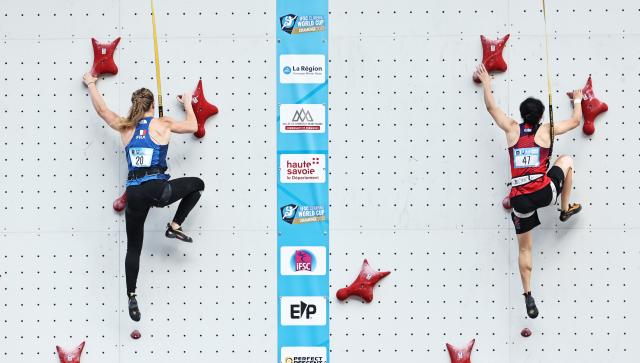(250712) -- CHARMONIX, July 12, 2025 (Xinhua) -- Zhang Shaoqin (R) of China competes during the Women's Speed Qualification of sport climbing at the 2025 IFSC Climbing World Cup Speed-Lead in Charmonix, France, July 11, 2025. (Xinhua/Gao Jing)