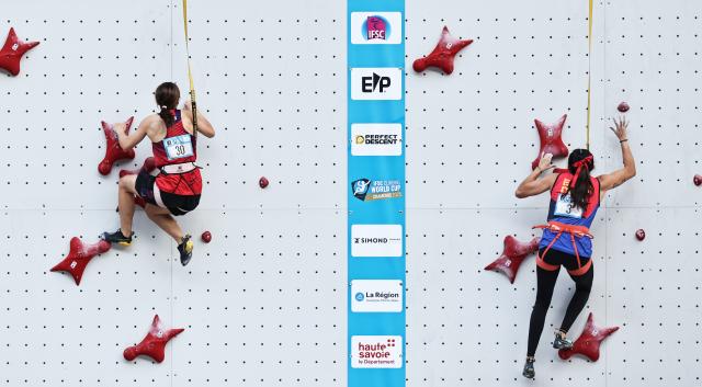 (250712) -- CHAMONIX, July 12, 2025 (Xinhua) -- Zhang Mengli (L) of China competes during the women's Speed Qualification of sport climbing at the 2025 IFSC Climbing World Cup Speed-Lead in Charmonix, France, July 11, 2025. (Xinhua/Gao Jing)