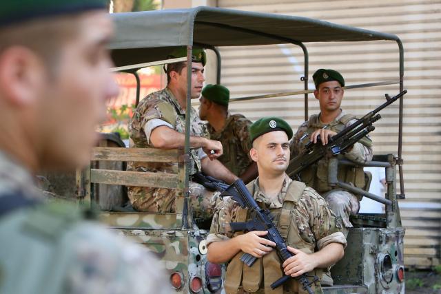 (250712) -- AL-NUMAIRIYAH, July 12, 2025 (Xinhua) -- Lebanese army soldiers stand guard at the scene following an Israeli drone strike in the town of Al-Numairiyah, Lebanon, on July 11, 2025.
  The Israel Defense Forces (IDF) said in a statement on Friday that the man it killed earlier in the day in an airstrike in Lebanon was involved in advancing attacks against Israeli civilians.
   Official and security sources in Lebanon reported earlier that Mohammad Hassan Shuaib was killed and five others were injured in an Israeli drone strike targeting a car in the town of Al-Numairiyah in southern Lebanon. (Photo by Ali Hashisho/Xinhua)