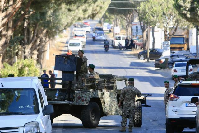 (250712) -- AL-NUMAIRIYAH, July 12, 2025 (Xinhua) -- Lebanese army soldiers stand guard at the scene following an Israeli drone strike in the town of Al-Numairiyah, Lebanon, on July 11, 2025.
  The Israel Defense Forces (IDF) said in a statement on Friday that the man it killed earlier in the day in an airstrike in Lebanon was involved in advancing attacks against Israeli civilians.
   Official and security sources in Lebanon reported earlier that Mohammad Hassan Shuaib was killed and five others were injured in an Israeli drone strike targeting a car in the town of Al-Numairiyah in southern Lebanon. (Photo by Ali Hashisho/Xinhua)