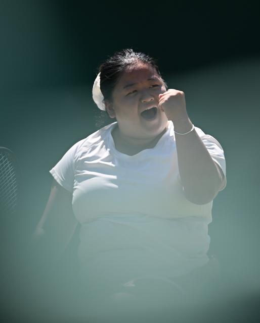 (250712) -- LONDON, July 12, 2025 (Xinhua) -- Wang Ziying celebrates victory after the women's wheelchair singles final between Wang Ziying of China and Kamiji Yui of Japan at the Wimbledon Tennis Championships in London, Britain, July 12, 2025. (Xinhua/Li Ying)