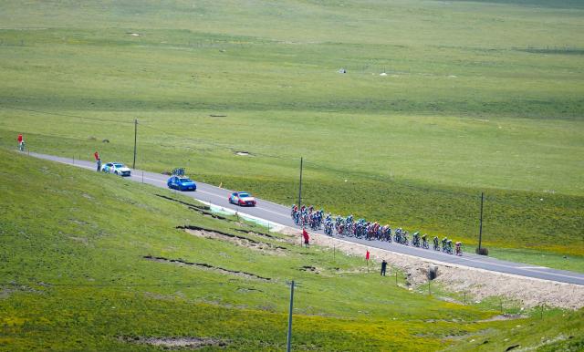 (250712) -- HAIYAN, July 12, 2025 (Xinhua) -- Cyclists compete during the Stage 7 of the Tour of Magnificent Qinghai International Road Cycling Race from Gonghe to Haiyan, northwest China's Qinghai Province, July 12, 2025. (Xinhua/Qi Zhiyue)