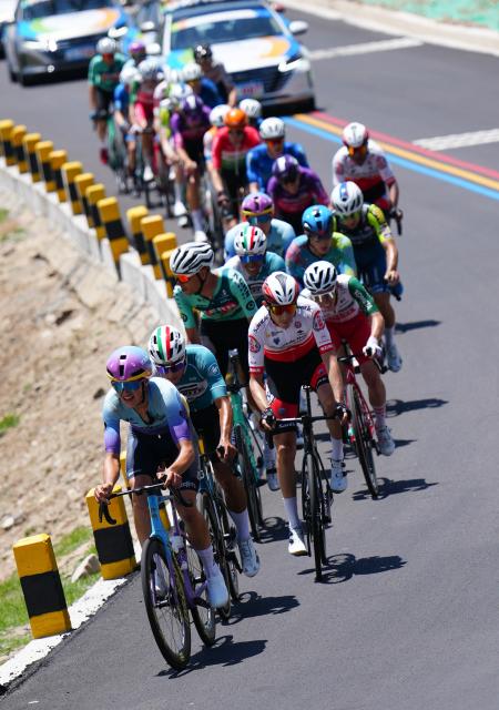 (250712) -- HAIYAN, July 12, 2025 (Xinhua) -- Cyclists compete during the Stage 7 of the Tour of Magnificent Qinghai International Road Cycling Race from Gonghe to Haiyan, northwest China's Qinghai Province, July 12, 2025. (Xinhua/Qi Zhiyue)