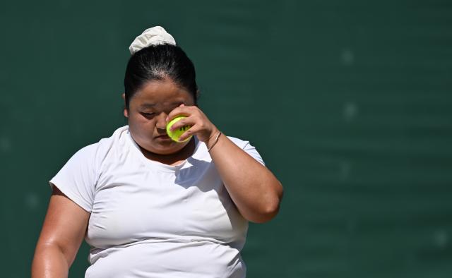 (250712) -- LONDON, July 12, 2025 (Xinhua) -- Wang Ziying reacts during the women's wheelchair singles final between Wang Ziying of China and Kamiji Yui of Japan at the Wimbledon Tennis Championships in London, Britain, July 12, 2025. (Xinhua/Li Ying)