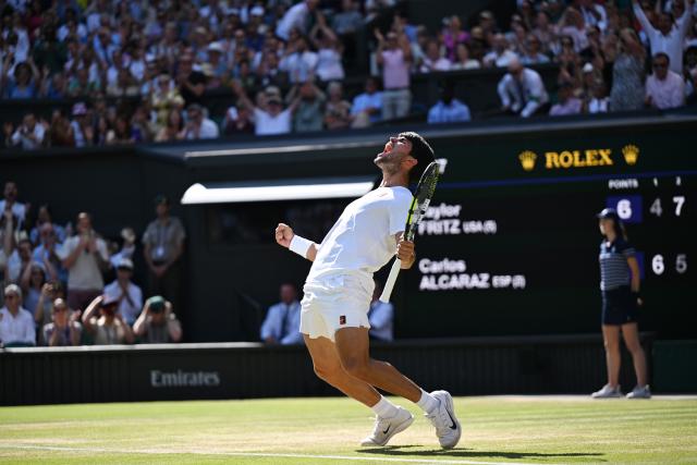 (250713) -- BEIJING, July 13, 2025 (Xinhua) -- Carlos Alcaraz celebrates winning the men's singles semifinal match between Carlos Alcaraz of Spain and Taylor Fritz of the United States at the Wimbledon Tennis Championships in London, Britain, July 11, 2025. (Xinhua/Zhao Dingzhe)