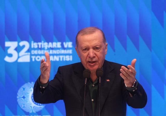 (250713) -- ANKARA, July 13, 2025 (Xinhua) -- Turkish President Recep Tayyip Erdogan speaks during the 32nd Consultation and Evaluation Meeting in Kizilcahamam district, Ankara Province, Türkiye, on July 12, 2025. Turkish President Recep Tayyip Erdogan on Saturday declared "a new page" in history for Türkiye, as the Kurdistan Workers' Party (PKK) begins the disarmament process.
   TO GO WITH "PKK disarmament opens 'new page in history' for Türkiye: Erdogan" (Mustafa Kaya/Handout via Xinhua)