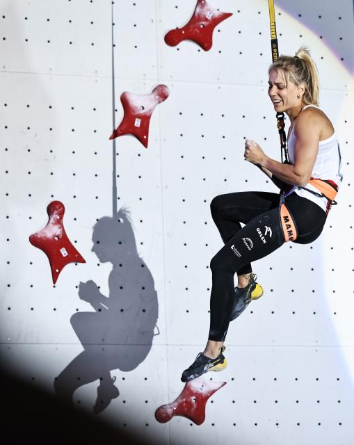 (250713) -- CHARMONIX, July 13, 2025 (Xinhua) -- Aleksandra Miroslaw of Poland celebrates winning the women's Speed final of sport climbing at the 2025 IFSC Climbing World Cup Speed-Lead in Charmonix, France, July 12, 2025. (Xinhua/Gao Jing)