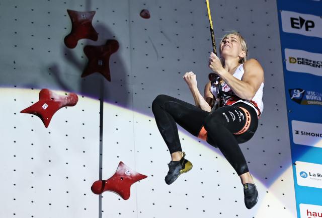 (250713) -- CHARMONIX, July 13, 2025 (Xinhua) -- Aleksandra Miroslaw of Poland celebrates winning the women's Speed final of sport climbing at the 2025 IFSC Climbing World Cup Speed-Lead in Charmonix, France, July 12, 2025. (Xinhua/Gao Jing)