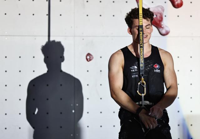 (250713) -- CHARMONIX, July 13, 2025 (Xinhua) -- Zach Hammer of the United States reacts after the men's Speed quarterfinal of sport climbing at the 2025 IFSC Climbing World Cup Speed-Lead in Charmonix, France, July 12, 2025. (Xinhua/Gao Jing)