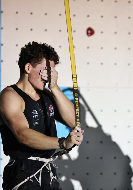 (250713) -- CHARMONIX, July 13, 2025 (Xinhua) -- Zach Hammer of the United States reacts after the men's Speed small final of sport climbing at the 2025 IFSC Climbing World Cup Speed-Lead in Charmonix, France, July 12, 2025. (Xinhua/Gao Jing)