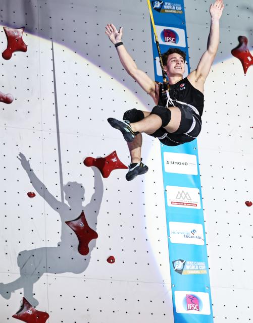 (250713) -- CHARMONIX, July 13, 2025 (Xinhua) -- Zach Hammer of the United States celebrates after the men's Speed small final of sport climbing at the 2025 IFSC Climbing World Cup Speed-Lead in Charmonix, France, July 12, 2025. (Xinhua/Gao Jing)