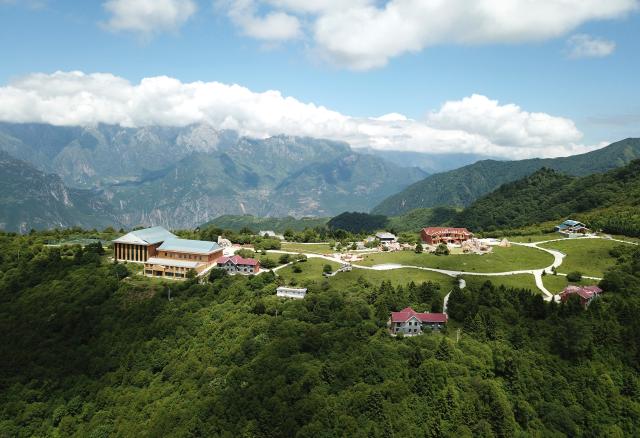 (250713) -- ZHOUQU(GANSU), July 13, 2025 (Xinhua) -- This aerial drone photo taken on July 12, 2025 shows the view of Lagashan Mountain in Zhouqu County, Gannan Tibetan Autonomous Prefecture, northwest China's Gansu Province. (Xinhua/Ma Ning)