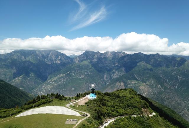 (250713) -- ZHOUQU(GANSU), July 13, 2025 (Xinhua) -- This aerial drone photo taken on July 12, 2025 shows the view of Lagashan Mountain in Zhouqu County, Gannan Tibetan Autonomous Prefecture, northwest China's Gansu Province. (Xinhua/Ma Ning)