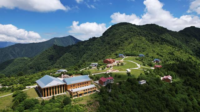 (250713) -- ZHOUQU(GANSU), July 13, 2025 (Xinhua) -- This aerial drone photo taken on July 12, 2025 shows the view of Lagashan Mountain in Zhouqu County, Gannan Tibetan Autonomous Prefecture, northwest China's Gansu Province. (Xinhua/Chen Bin)