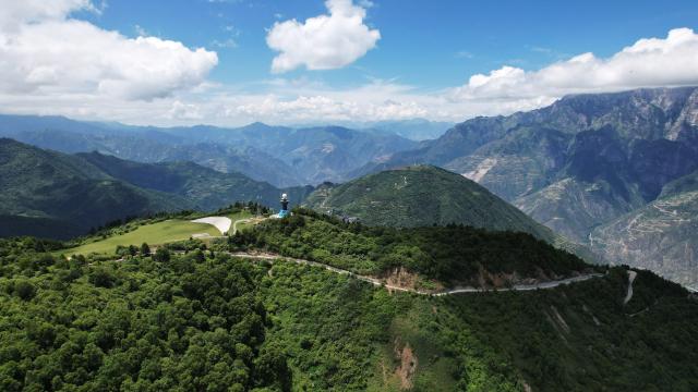 (250713) -- ZHOUQU(GANSU), July 13, 2025 (Xinhua) -- This aerial drone photo taken on July 12, 2025 shows the view of Lagashan Mountain in Zhouqu County, Gannan Tibetan Autonomous Prefecture, northwest China's Gansu Province. (Xinhua/Chen Bin)