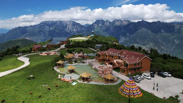 (250713) -- ZHOUQU(GANSU), July 13, 2025 (Xinhua) -- This aerial drone photo taken on July 12, 2025 shows the view of Lagashan Mountain in Zhouqu County, Gannan Tibetan Autonomous Prefecture, northwest China's Gansu Province. (Xinhua/Chen Bin)