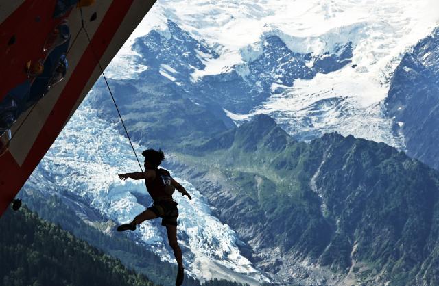 (250713) -- CHARMONIX, July 13, 2025 (Xinhua) -- Pan Yufei of China competes during the men's lead semifinal of sport climbing at the 2025 IFSC Climbing World Cup Speed-Lead in Charmonix, France, July 13, 2025. (Xinhua/Gao Jing)