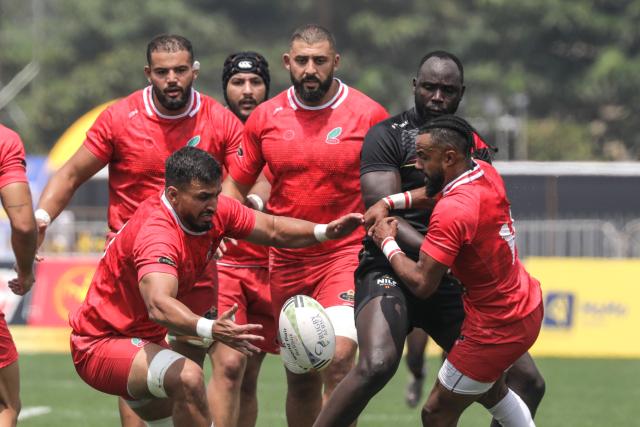 (250713) -- KAMPALA, July 13, 2025 (Xinhua) -- Players of both teams vie for the ball during the Rugby Africa Cup 5th place playoff match between Uganda and Morocco in Kampala, Uganda, July 13, 2025. (Photo by Hajarah Nalwadda/Xinhua)