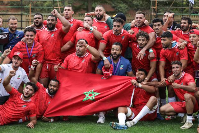 (250713) -- KAMPALA, July 13, 2025 (Xinhua) -- Players of Morocco celebrate after the Rugby Africa Cup 5th place playoff match between Uganda and Morocco in Kampala, Uganda, July 13, 2025. (Photo by Hajarah Nalwadda/Xinhua)
