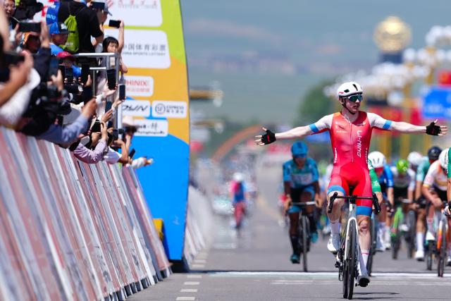 (250713) -- HAIYAN, July 13, 2025 (Xinhua) -- Alexander Salby of Li Ning Star celebrates after crossing the finish line during Stage 8 of the Tour of Magnificent Qinghai International Road Cycling Race in Haiyan, northwest China's Qinghai Province, July 13, 2025. (Xinhua/Qi Zhiyue)
