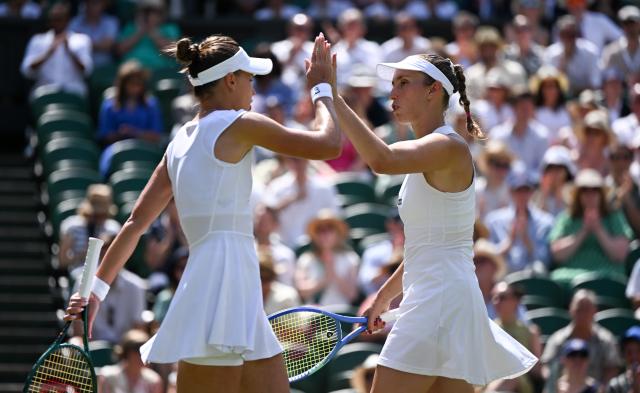 (250713) -- LONDON, July 13, 2025 (Xinhua) -- Veronika Kudermetova/Elise Mertens (R) celebrate during the women's doubles final between Hsieh Su-Wei (Chinese Taipei)/Jelena Ostapenko (Latvia) and Veronika Kudermetova (Russia)/Elise Mertens (Belgium) at the Wimbledon Tennis Championships in London, Britain, July 13, 2025. (Xinhua/Li Ying)