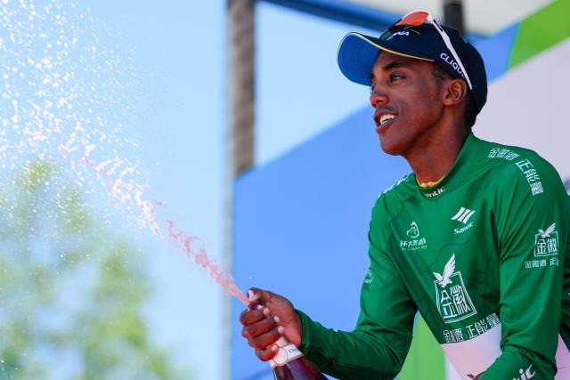 (250713) -- HAIYAN, July 13, 2025 (Xinhua) -- Solomon Henok Mulueberhan of XDS Astana Team celebrates in the green jersey on the podium after Stage 8 of the Tour of Magnificent Qinghai International Road Cycling Race in Haiyan, northwest China's Qinghai Province, July 13, 2025. (Xinhua/Qi Zhiyue)