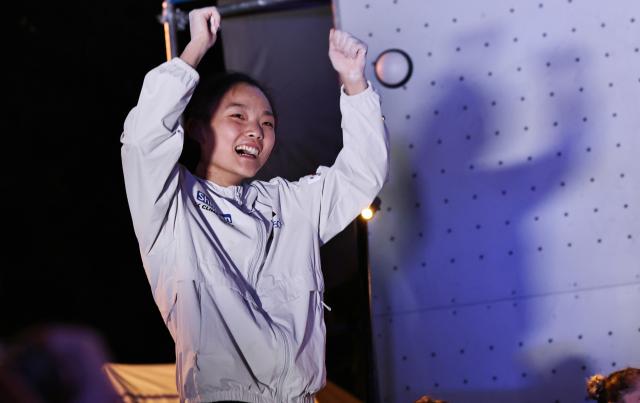(250714) -- CHAMONIX, July 14, 2025 (Xinhua) -- Seo Chaehyun of South Korea celebrates after winning the women's lead final of sport climbing at the 2025 IFSC Climbing World Cup Speed-Lead in Chamonix, France, July 13, 2025. (Xinhua/Gao Jing)