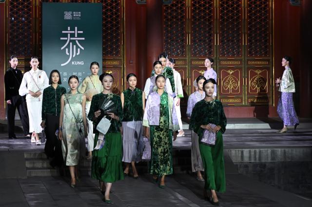 (250715) -- BEIJING, July 15, 2025 (Xinhua) -- Models present neo-Chinese ready-to-wear designs during a fashion show held at the Prince Kung's Palace Museum in Beijing, capital of China, July 14, 2025. The fashion show is inspired by elements of the Prince Kung's Palace Museum and Chinese intangible cultural heritages, displaying 37 concept creations as well as 35 neo-Chinese ready-to-wear and accessories. (Xinhua/Jin Liangkuai)