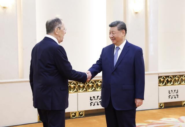 (250715) -- BEIJING, July 15, 2025 (Xinhua) -- Chinese President Xi Jinping meets with Russian Foreign Minister Sergey Lavrov at the Great Hall of the People in Beijing, capital of China, July 15, 2025. (Xinhua/Ding Lin)