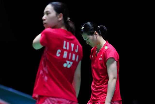 (250715) -- TOKYO, July 15, 2025 (Xinhua) -- Li Yijing/Luo Xumin (R) react during the women's doubles round of 32 match between Li Yijing/Luo Xumin of China and Otake Mizuki/Takahashi Miyu of Japan at the Japan Badminton Open 2025 in Tokyo, Japan, July 15, 2025. (Xinhua/Jia Haocheng)