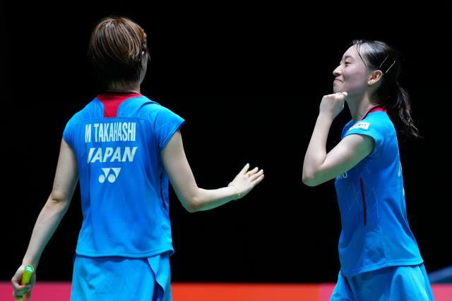 (250715) -- TOKYO, July 15, 2025 (Xinhua) -- Otake Mizuki (R)/Takahashi Miyu celebrate scoring during the women's doubles round of 32 match between Li Yijing/Luo Xumin of China and Otake Mizuki/Takahashi Miyu of Japan at the Japan Badminton Open 2025 in Tokyo, Japan, July 15, 2025. (Xinhua/Jia Haocheng)