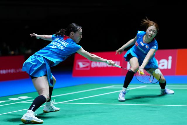 (250715) -- TOKYO, July 15, 2025 (Xinhua) -- Otake Mizuki (L)/Takahashi Miyu compete during the women's doubles round of 32 match between Li Yijing/Luo Xumin of China and Otake Mizuki/Takahashi Miyu of Japan at the Japan Badminton Open 2025 in Tokyo, Japan, July 15, 2025. (Xinhua/Jia Haocheng)