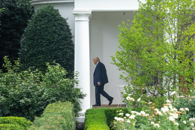 (250715) -- WASHINGTON, July 15, 2025 (Xinhua) -- U.S. President Donald Trump walks toward the South Lawn of the White House in Washington, D.C., the United States, on July 15, 2025. Trump announced Tuesday that a 19 percent tariff will be imposed on imports from Indonesia while the United States will pay nothing, local media reported. (Xinhua/Hu Yousong)