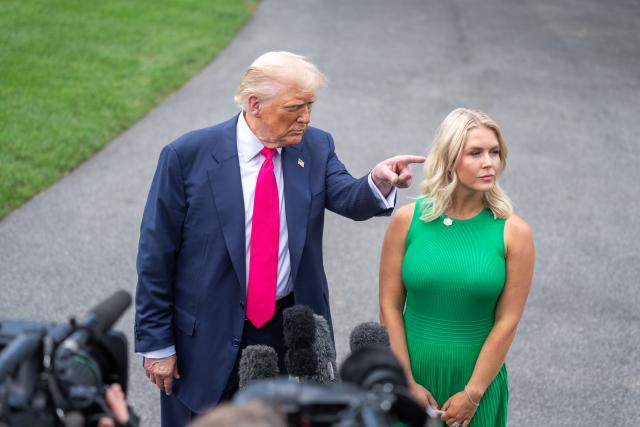 (250715) -- WASHINGTON, July 15, 2025 (Xinhua) -- U.S. President Donald Trump (L) takes questions at the White House in Washington, D.C., the United States, on July 15, 2025. Trump announced Tuesday that a 19 percent tariff will be imposed on imports from Indonesia while the United States will pay nothing, local media reported. (Xinhua/Hu Yousong)