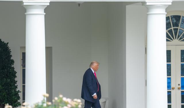 (250715) -- WASHINGTON, July 15, 2025 (Xinhua) -- U.S. President Donald Trump walks toward the Rose Garden of the White House in Washington, D.C., the United States, on July 15, 2025. Trump announced Tuesday that a 19 percent tariff will be imposed on imports from Indonesia while the United States will pay nothing, local media reported. (Xinhua/Hu Yousong)