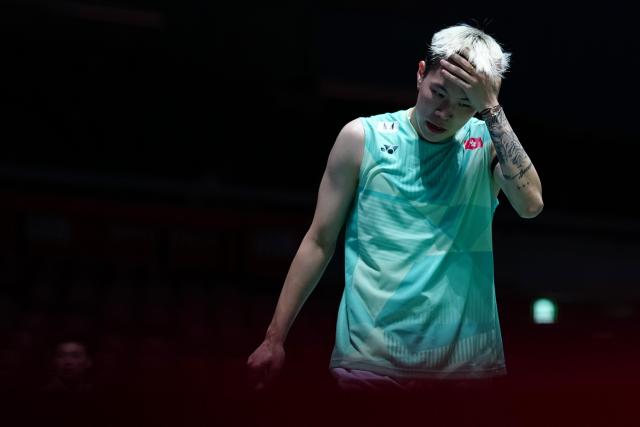 (250716) -- TOKYO, July 16, 2025 (Xinhua) -- Lee Cheuk Yiu reacts during the men's singles round of 32 match between Li Shifeng of China and Lee Cheuk Yiu of China's Hong Kong at the Japan Badminton Open 2025 in Tokyo, Japan, July 16, 2025. (Xinhua/Jia Haocheng)
