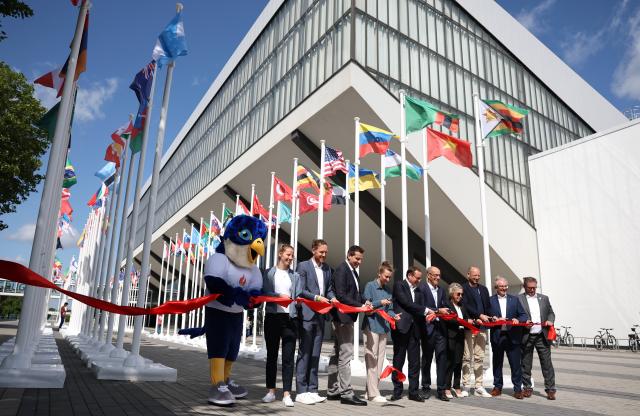 (250716) -- ESSEN, July 16, 2025 (Xinhua) -- Photo taken on July 15, 2025 shows the official opening ceremony of the Flag Plaza for the Rhine-Ruhr 2025 FISU World University Games in Essen, Germany. (Xinhua/Zhang Chen)