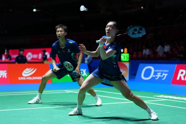 (250716) -- TOKYO, July 16, 2025 (Xinhua) -- Jiang Zhenbang/Wei Yaxin (R) compete during the mixed doubles round of 32 match between Jiang Zhenbang/Wei Yaxin of China and Gao Jiaxuan/Wu Mengying of China at the Japan Badminton Open 2025 in Tokyo, Japan, July 16, 2025. (Xinhua/Jia Haocheng)
