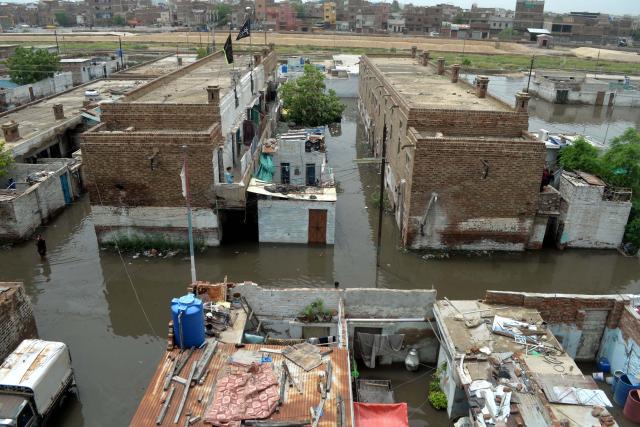 (250716) -- HYDERABAD, July 16, 2025 (Xinhua) -- A flooded residential area is seen after heavy monsoon rains in southern Pakistan's Hyderabad on July 15, 2025. Torrential monsoon rains and associated incidents have left at least 124 people dead and 264 others injured across Pakistan over the past three weeks, the National Disaster Management Authority (NDMA) said Wednesday. (Str/Xinhua)
