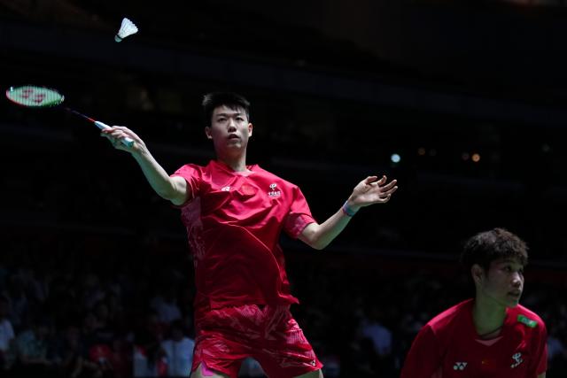 (250717) -- TOKYO, July 17, 2025 (Xinhua) -- Feng Yanzhe (L)/Huang Dongping compete during the mixed doubles round of 16 match between Feng Yanzhe/Huang Dongping of China and Wang Chan/Jeong Na Eun of South Korea at the Japan Badminton Open 2025 in Tokyo, Japan, July 17, 2025. (Xinhua/Jia Haocheng)