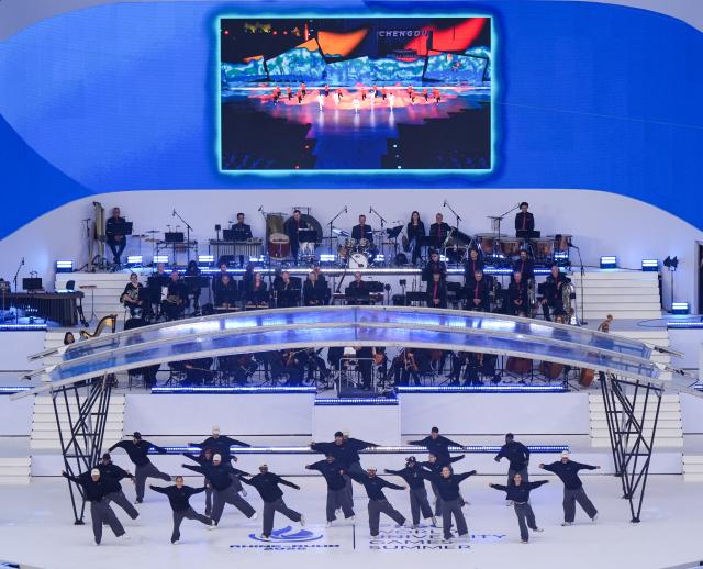 (250717) -- DUISBURG, July 17, 2025 (Xinhua) -- Artists perform during the opening ceremony of the Rhine-Ruhr 2025 FISU World University Games in Duisburg, Germany, July 16, 2025. (Xinhua/Wang Xi)