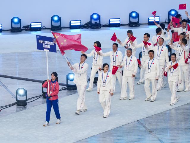 (250717) -- DUISBURG, July 17, 2025 (Xinhua) -- Delegation of China parade during the opening ceremony of the Rhine-Ruhr 2025 FISU World University Games in Duisburg, Germany, July 16, 2025. (Xinhua/Wang Xi)