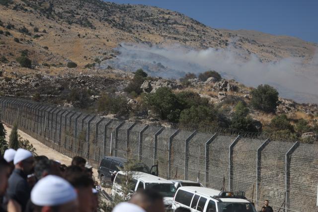 (250717) -- GOLAN HEIGHTS, July 17, 2025 (Xinhua) -- People of Druze community are seen in the buffer zone in the Golan Heights, on July 16, 2025. Dozens of Druze citizens of Israel crossed from the Israeli-occupied Golan Heights into southern Syria on Tuesday afternoon, Israeli sources said, amid deadly clashes between Druze fighters and the Syrian interim government's forces.
   Israel's military said in a statement that troops were operating to return the civilians safely.
   The individuals crossed from Majdal Shams in the Israeli-occupied Golan Heights into the Druze village of Hader in southern Syria.
   According to Israel's Army Radio, the incident followed calls on social media by Druze in Lebanon to support their counterparts in Syria's southern province of Sweida.
   Israel launched a series of airstrikes on Tuesday targeting convoys of Syrian forces in and around the southern Syrian city of Sweida, killing and wounding several personnel and further escalating days of deadly clashes between local Druze armed factions, Bedouin tribes, and the Syrian interim government's forces.
   The Druze are a religious and ethnic minority originating from Islam, primarily living in Syria, Lebanon, and Israel, with smaller communities in Jordan and elsewhere. (Photo by Jamal Awad/Xinhua)