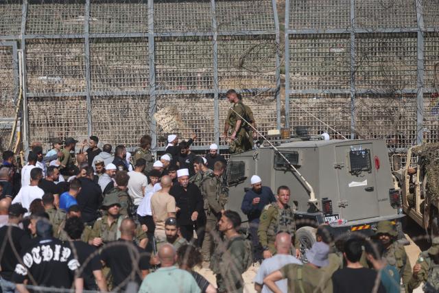 (250717) -- GOLAN HEIGHTS, July 17, 2025 (Xinhua) -- Israeli troops are seen in the Israeli-occupied Golan Heights, on July 16, 2025. Dozens of Druze citizens of Israel crossed from the Israeli-occupied Golan Heights into southern Syria on Tuesday afternoon, Israeli sources said, amid deadly clashes between Druze fighters and the Syrian interim government's forces.
   Israel's military said in a statement that troops were operating to return the civilians safely.
   The individuals crossed from Majdal Shams in the Israeli-occupied Golan Heights into the Druze village of Hader in southern Syria.
   According to Israel's Army Radio, the incident followed calls on social media by Druze in Lebanon to support their counterparts in Syria's southern province of Sweida.
   Israel launched a series of airstrikes on Tuesday targeting convoys of Syrian forces in and around the southern Syrian city of Sweida, killing and wounding several personnel and further escalating days of deadly clashes between local Druze armed factions, Bedouin tribes, and the Syrian interim government's forces.
   The Druze are a religious and ethnic minority originating from Islam, primarily living in Syria, Lebanon, and Israel, with smaller communities in Jordan and elsewhere. (Photo by Jamal Awad/Xinhua)