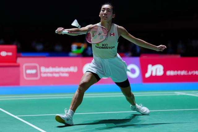 (250717) -- TOKYO, July 17, 2025 (Xinhua) -- Michelle Li hits a return during the women's singles round of 16 match between Chen Yufei of China and Michelle Li of Canada at the Japan Badminton Open 2025 in Tokyo, Japan, July 17, 2025. (Xinhua/Jia Haocheng)