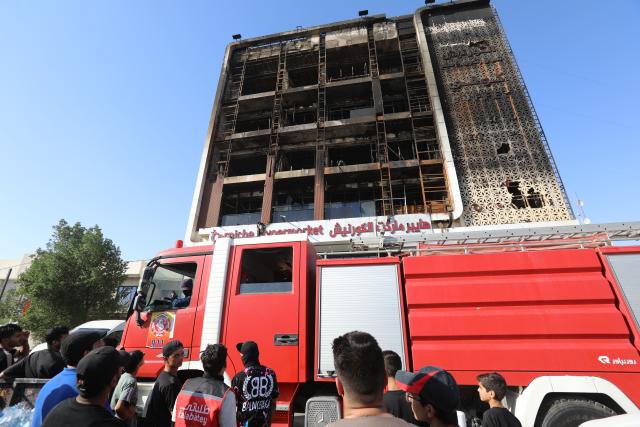 (250717) -- WASIT, July 17, 2025 (Xinhua) -- This photo taken on July 17, 2025 shows the building after a devastating fire was put out in Kut city, Wasit province, Iraq. The death toll from a devastating fire at a hypermarket in Kut, the capital of Iraq's Wasit province, has risen to 61, the Interior Ministry confirmed on Thursday. (Xinhua/Khalil Dawood)