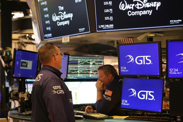 (250717) -- NEW YORK, July 17, 2025 (Xinhua) -- Traders talk on the floor of the New York Stock Exchange in New York, the United States, on July 17, 2025. U.S. stocks ended higher on Thursday. The Dow Jones Industrial Average rose 0.52 percent to 44,484.49. The S&P 500 gained 0.54 percent to 6,297.36, while the Nasdaq Composite Index rose 0.75 percent to 20,885.65. (Xinhua/Liu Yanan)